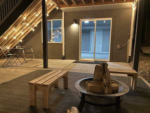 Out back patio under upper deck