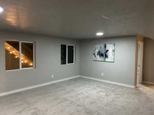 Unfurnished extra large living room at night