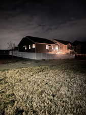 Corner lot home at night