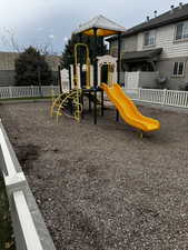 Communal playground featuring fence