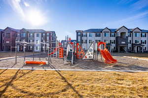 Communal playground featuring a yard