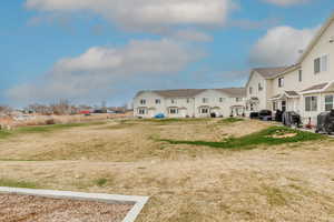 View of yard featuring a residential view