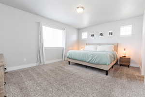 Master Bedroom featuring Natural lighting, nice sized room.