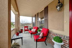 View of patio featuring a porch