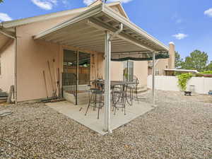 View of patio / terrace featuring fence