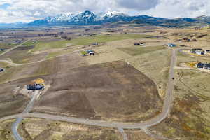 Birds eye view of property featuring a mountain view and a rural view