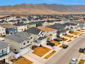 Aerial view featuring a residential view and a mountain view
