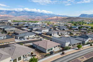 Aerial view of residential area featuring mountains