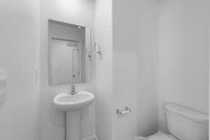 Bathroom with toilet and a sink