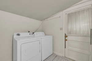 Laundry room is off the kitchen with a door coming in from the patio