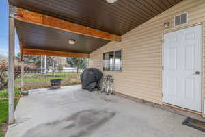 Covered carport on side of home