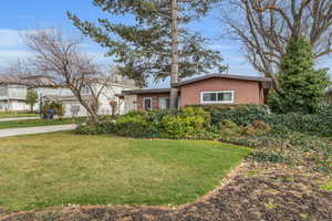 Front yard with mature landscaping