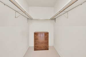 View of spacious walk-in closet