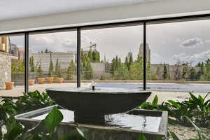 South view from lobby looking out at covered pool area
