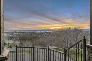 Balcony at dusk with a mountain view