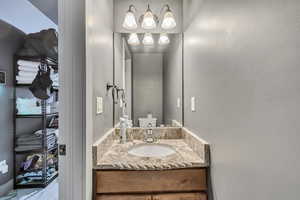 Half bath with toilet and vanity