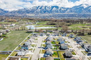 Bird's eye view with a water and mountain view and a residential view