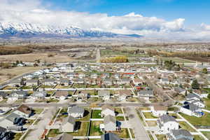Drone / aerial view featuring a residential view and a mountain view