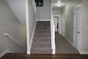 Stairways , wood finished floors and carpeted     hallway