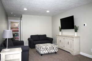 Another view of 2nd Floor landing with recessed lighting and carpet