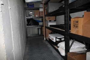 View of cold  storage room under the front porch.