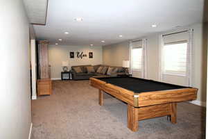 Game room with light colored carpet, billiards, and recessed lighting