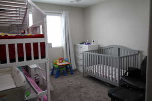 Bedroom featuring carpet flooring