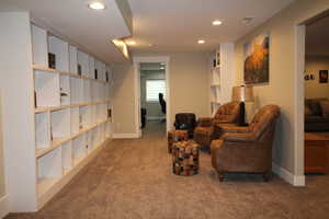 Sitting room featuring, visible, carpet floors, and recessed lighting