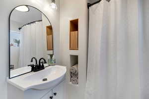 Full bathroom with vanity