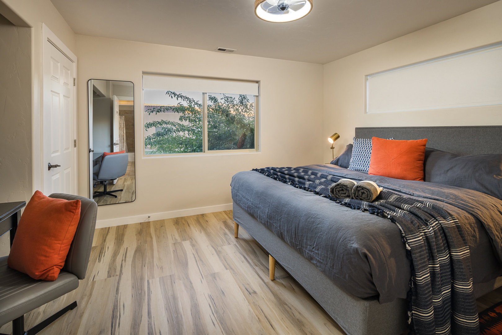 Bedroom featuring baseboards, visible vents, and light wood-type flooring