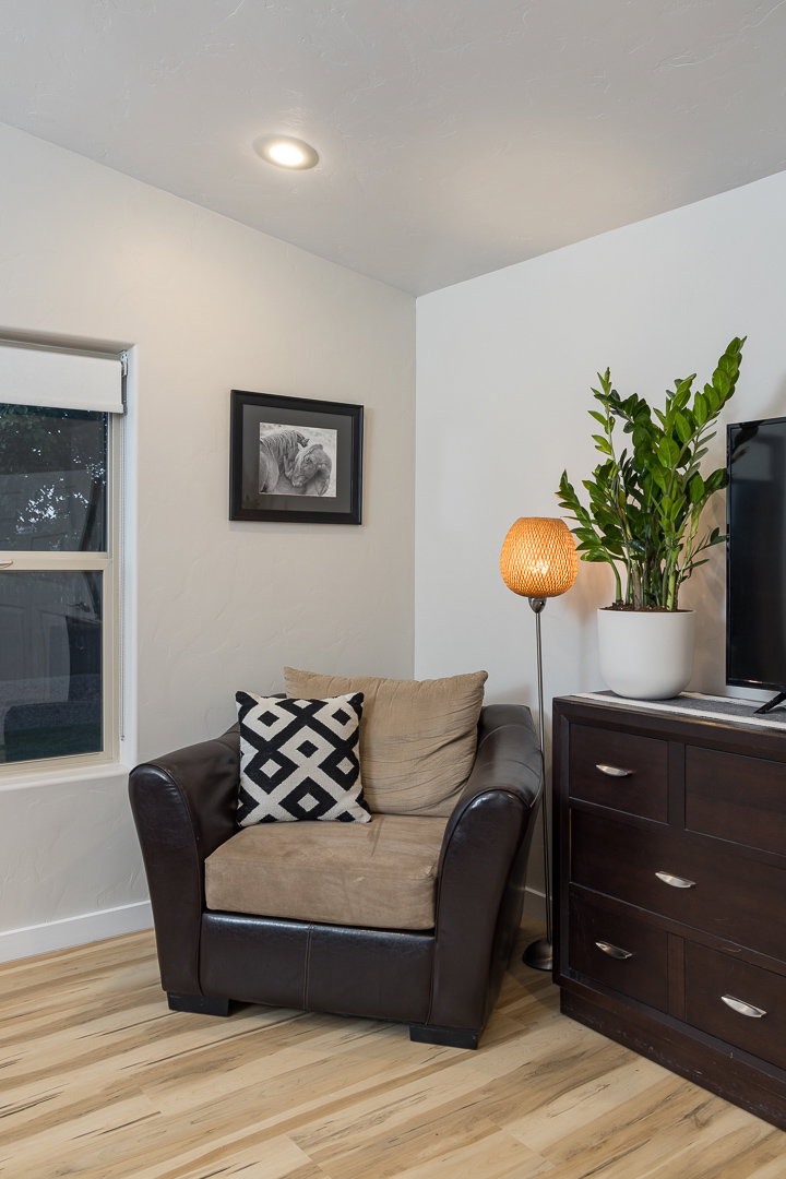 Sitting room featuring light wood finished floors and baseboards