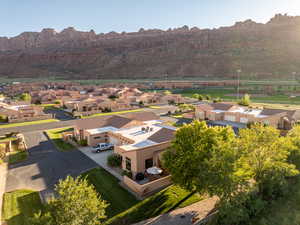 Drone / aerial view featuring a mountain view and a residential view