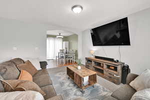 Living area featuring arched walkways