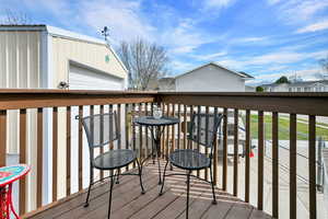 Deck featuring an outbuilding