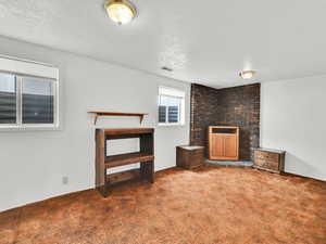 This could be a small sitting room or family room, game room or bedroom without a closet.