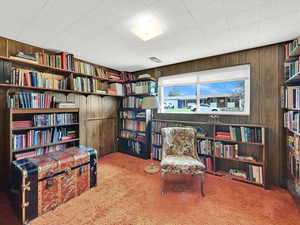Library with hidden storage space and if wanted a lot of the books could be left for you