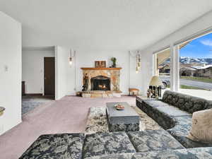 Large living room with stone fireplace