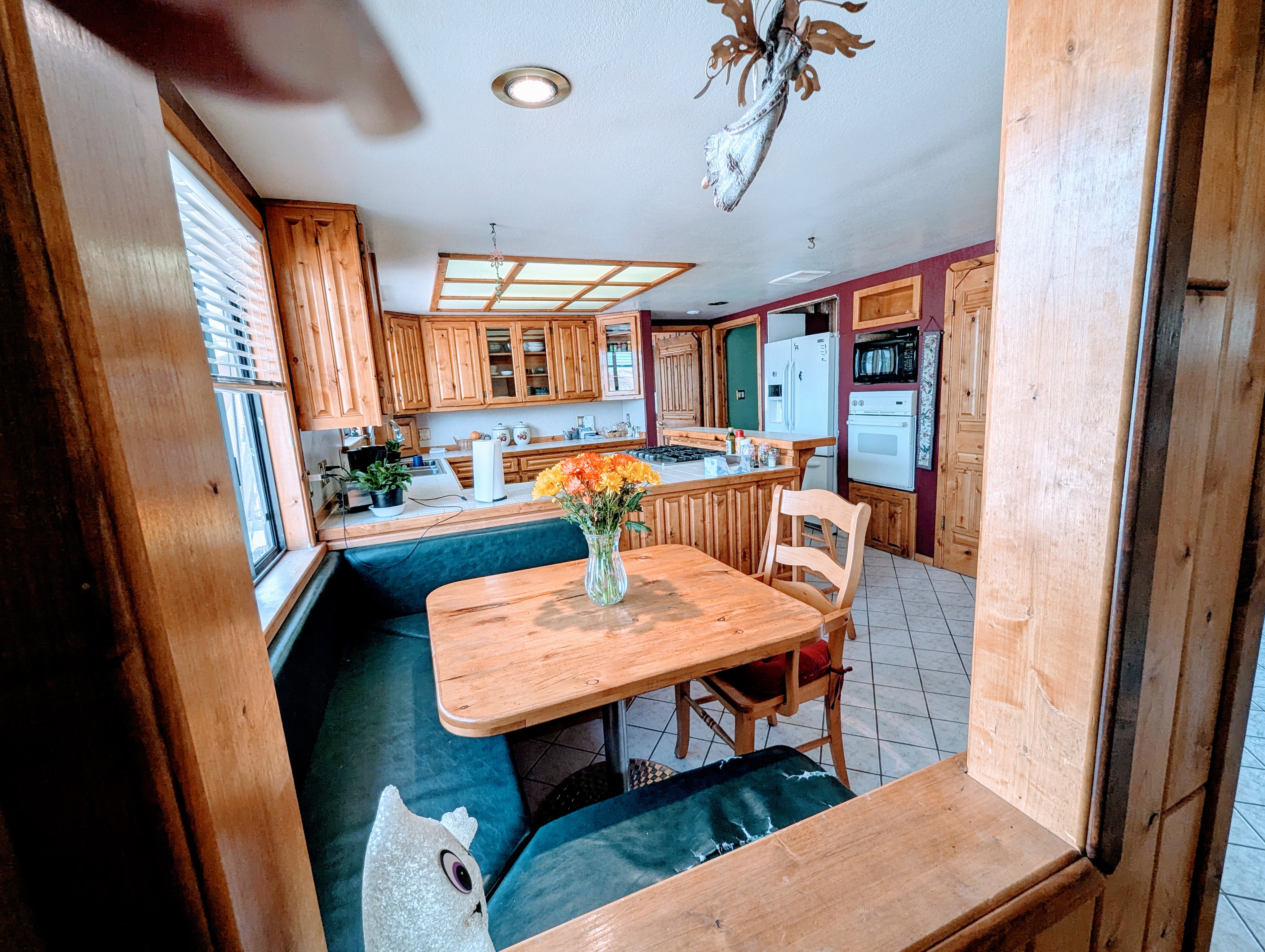 Dining room featuring light tile patterned flooring