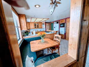 Dining room featuring light tile patterned flooring