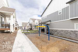 View of home's community featuring a residential view and playground