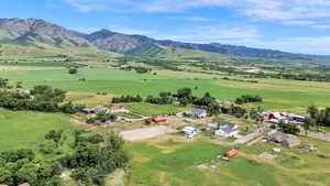 Overview of rural landscape with a mountainous background