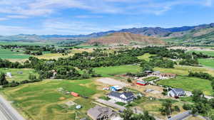 Aerial overview of property's location with a mountain backdrop