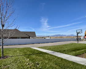 View of yard with a mountain view