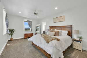 Bedroom with carpet flooring, recessed lighting, and ceiling fan