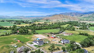 View of property location with a mountain backdrop and rural landscape