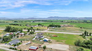 Overview of rural landscape with a mountain backdrop