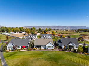 Aerial view featuring a residential view and a mountain view