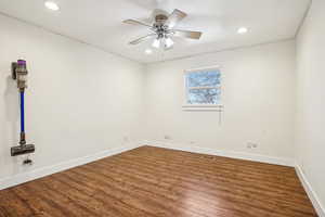 Empty room with a ceiling fan, visible vents, recessed lighting, wood finished floors, and baseboards