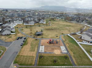 This playground and huge park are just steps from the back yard.
