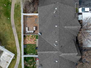 The cute yard and walking trail from above.